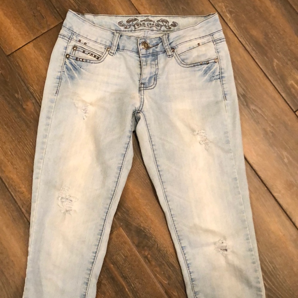 Juniors size 3 wax brand  jeans with rip detail